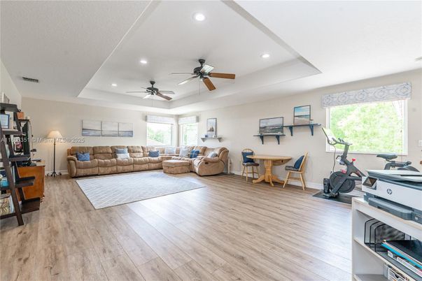 Dining room, Fitness Equipment, Interior, Living room, Recessed Lighting, Wood Texture Flooring