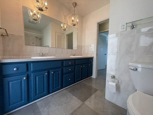 Bathroom, Chandelier, Dual Sink Vanities, Interior, Pendant Lights