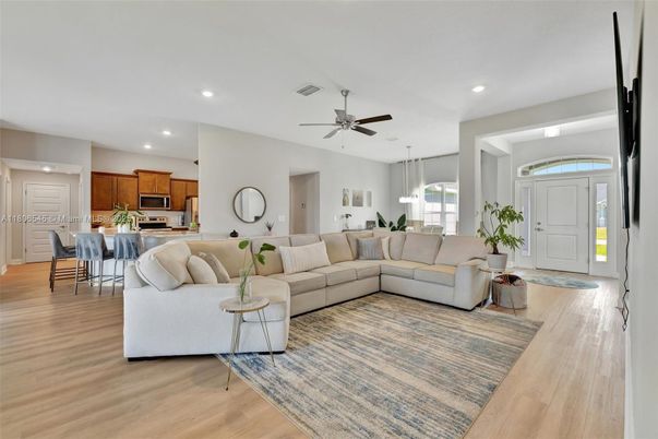Dining room, Interior, Kitchen, Living room, Pendant Lights, Recessed Lighting, Stainless Steel Appliances, Wood Texture Flooring