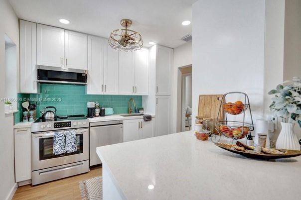 Interior, Kitchen, Recessed Lighting, Stainless Steel Appliances, Wood Texture Flooring