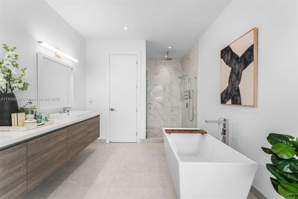 Bathroom, Dual Sink Vanities, Free Standing Baths, Glass Shower, Interior, Marble Walls, Recessed Lighting
