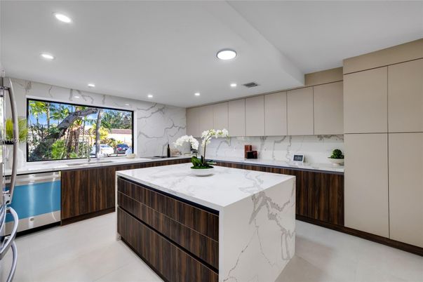 Interior, Kitchen, Marble Walls, Recessed Lighting, Stainless Steel Appliances