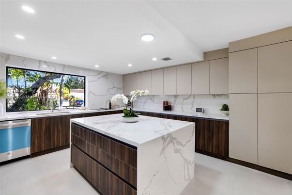 Interior, Kitchen, Marble Walls, Recessed Lighting, Stainless Steel Appliances