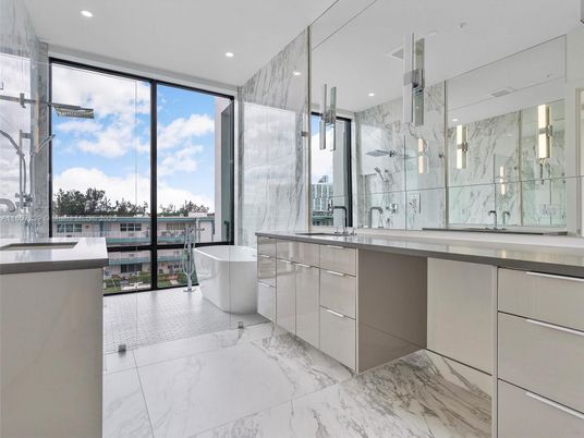 Bathroom, Dual Sink Vanities, Free Standing Baths, Glass Shower, Interior, Marble, Marble Walls, Recessed Lighting