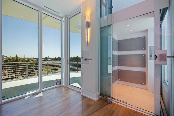 Elevator, Interior, Recessed Lighting, Wood Texture Flooring