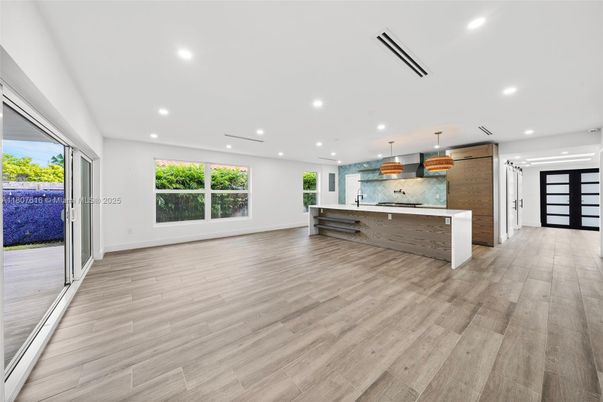 Interior, Kitchen, Marble Walls, Pendant Lights, Recessed Lighting, Wood Texture Flooring