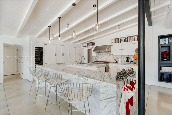 Interior, Kitchen, Marble Walls, Pendant Lights, Recessed Lighting, Stainless Steel Appliances