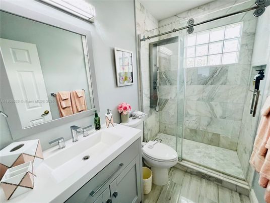 Bathroom, Glass Shower, Interior, Marble Walls, Wood Texture Flooring