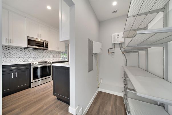 Interior, Kitchen, Recessed Lighting, Stainless Steel Appliances, Wood Texture Flooring