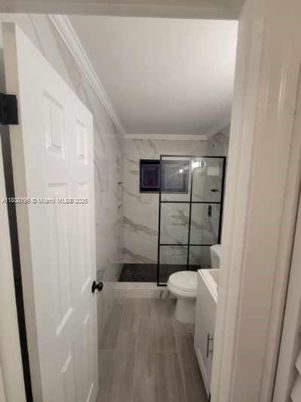 Bathroom, Glass Shower, Interior, Marble Walls, Wood Texture Flooring