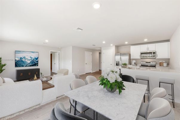 Dining room, Interior, Kitchen, Living room, Recessed Lighting, Stainless Steel Appliances, Wood Texture Flooring