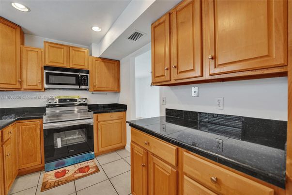 Interior, Kitchen, Recessed Lighting, Tile Countertops