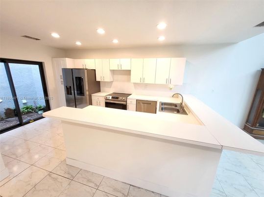 Interior, Kitchen, Marble, Recessed Lighting, Stainless Steel Appliances, Water
