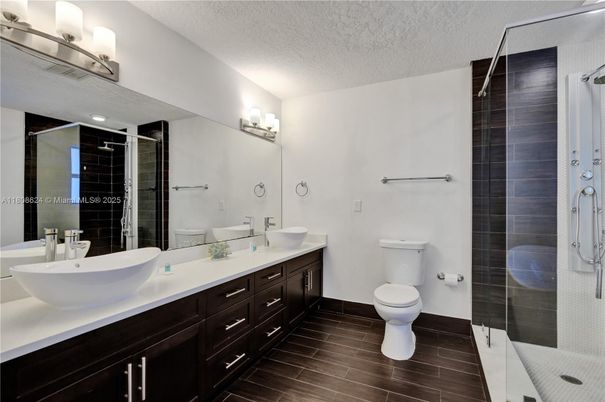 Bathroom, Dual Sink Vanities, Glass Shower, Interior, Wood Texture Flooring