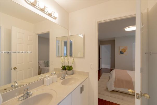 Bathroom, Dual Sink Vanities, Interior, Recessed Lighting, Wood Texture Flooring