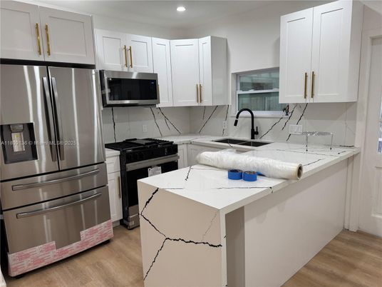 Interior, Kitchen, Recessed Lighting, Stainless Steel Appliances, Wood Texture Flooring