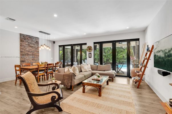 Dining room, Interior, Living room, Pendant Lights, Recessed Lighting, Stone Walls, Wood Texture Flooring