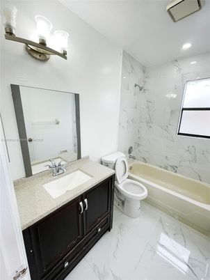 Bathroom, Dual Sink Vanities, Interior, Marble, Marble Walls, Recessed Lighting