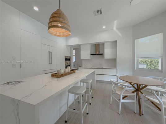 Chandelier, Dining room, Interior, Kitchen, Recessed Lighting, Stainless Steel Appliances, Wood Texture Flooring