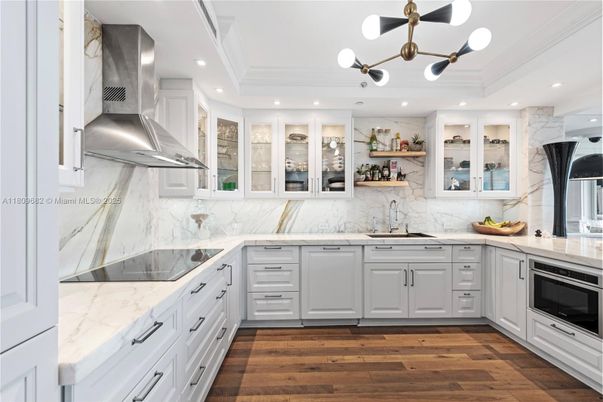 Interior, Kitchen, Marble Walls, Pendant Lights, Recessed Lighting, Stainless Steel Appliances, Wood Texture Flooring