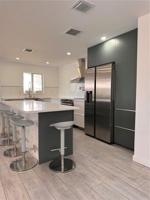 Interior, Kitchen, Recessed Lighting, Stainless Steel Appliances, Wood Texture Flooring
