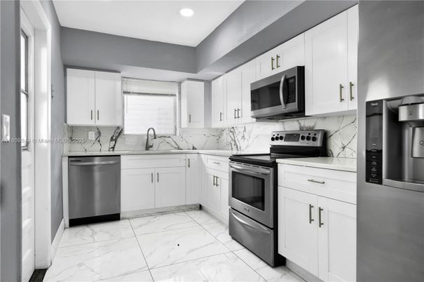 Interior, Kitchen, Marble, Marble Walls, Recessed Lighting, Stainless Steel Appliances