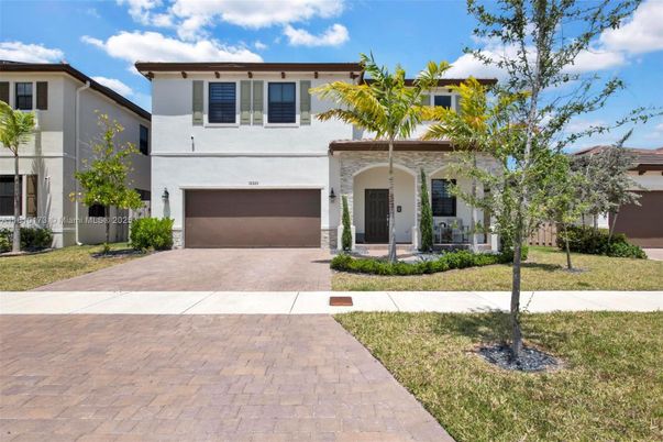 Attached, Exterior, Facade, Spanish Mediterranean