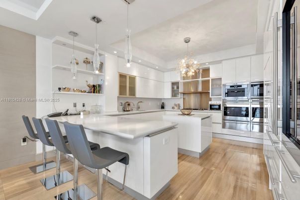 Chandelier, Interior, Kitchen, Pendant Lights, Recessed Lighting, Stainless Steel Appliances, Wood Texture Flooring