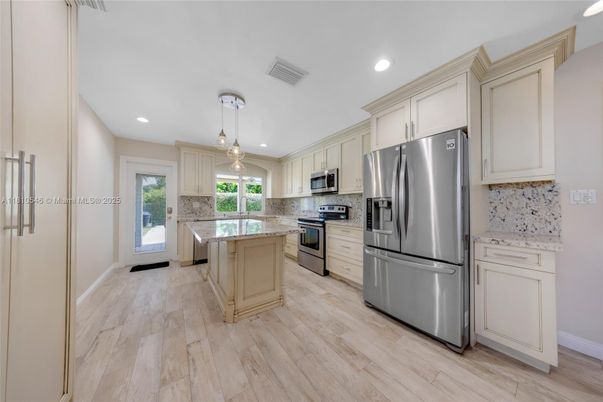 Interior, Kitchen, Pendant Lights, Recessed Lighting, Stainless Steel Appliances, Wood Texture Flooring
