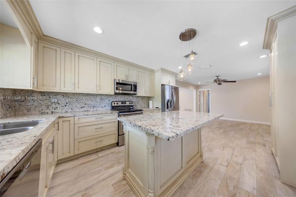 Interior, Kitchen, Pendant Lights, Recessed Lighting, Stainless Steel Appliances, Wood Texture Flooring
