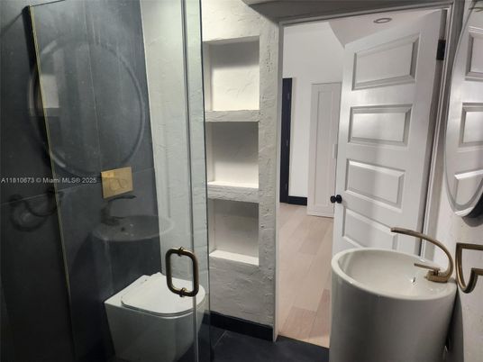 Bathroom, Free Standing Baths, Glass Shower, Interior, Marble Walls, Wood Texture Flooring