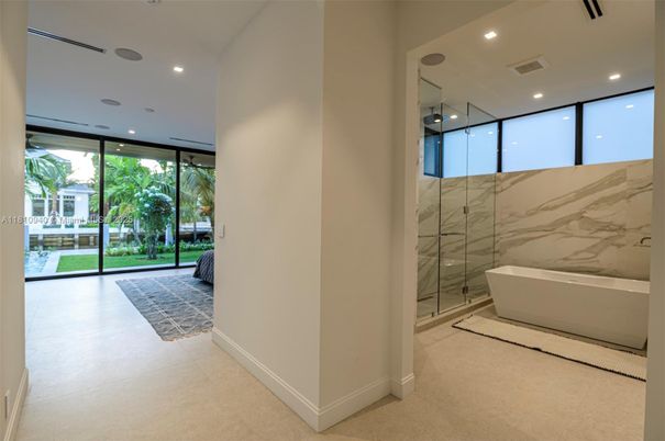 Bathroom, Free Standing Baths, Glass Shower, Interior, Marble Walls, Recessed Lighting