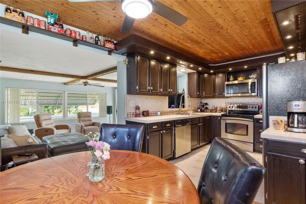 Interior, Kitchen, Living room, Recessed Lighting, Stainless Steel Appliances, Tile Countertops, Wooden Ceilings