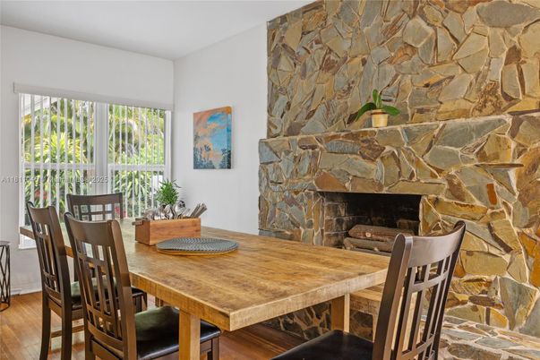 Dining room, Fireplace, Interior, Stone Walls, Wood Texture Flooring