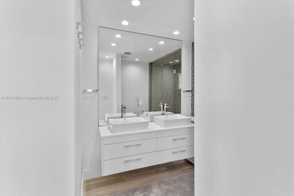 Bathroom, Dual Sink Vanities, Interior, Recessed Lighting, Wood Texture Flooring