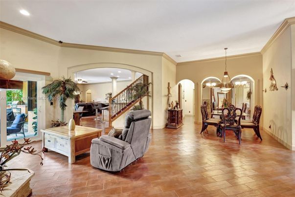 Chandelier, Dining room, Interior, Pendant Lights, Piano, Recessed Lighting, Wood Texture Flooring