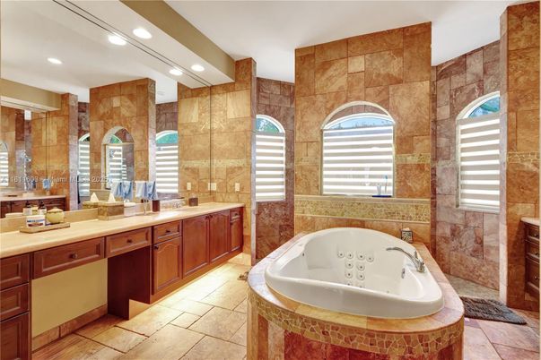 Bathroom, Dual Sink Vanities, Interior, Recessed Lighting, Stone Walls