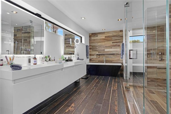 Bathroom, Dual Sink Vanities, Free Standing Baths, Glass Shower, Interior, Recessed Lighting, Wood Texture Flooring, Wooden Walls