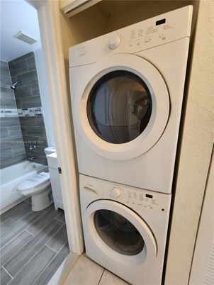 Bathroom, Interior, Utility Closets, Washer, Wood Texture Flooring