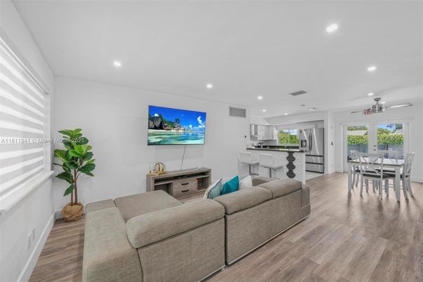 Dining room, Interior, Kitchen, Living room, Recessed Lighting, Stainless Steel Appliances, Wood Texture Flooring