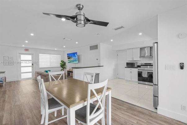 Dining room, Interior, Kitchen, Recessed Lighting, Stainless Steel Appliances, Wood Texture Flooring