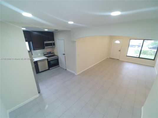 Empty room, Interior, Kitchen, Recessed Lighting, Stainless Steel Appliances