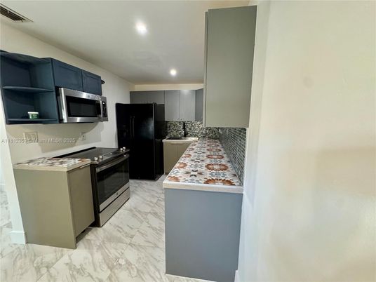 Interior, Kitchen, Marble, Recessed Lighting, Stainless Steel Appliances