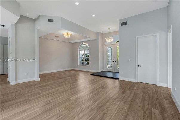 Chandelier, Empty room, Interior, Recessed Lighting, Wood Texture Flooring