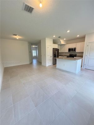 Empty room, Interior, Kitchen, Recessed Lighting, Stainless Steel Appliances