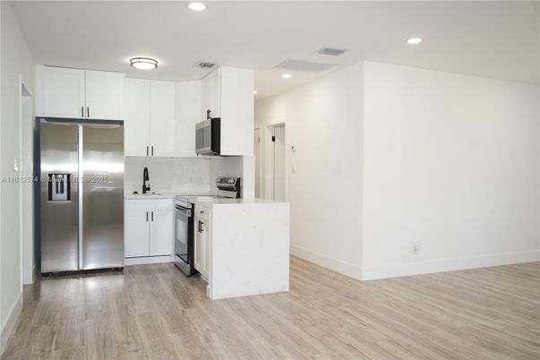 Interior, Kitchen, Recessed Lighting, Stainless Steel Appliances, Wood Texture Flooring
