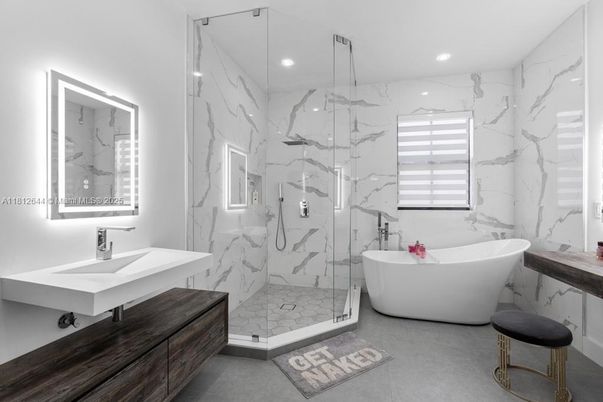 Bathroom, Free Standing Baths, Glass Shower, Interior, Marble Walls, Recessed Lighting
