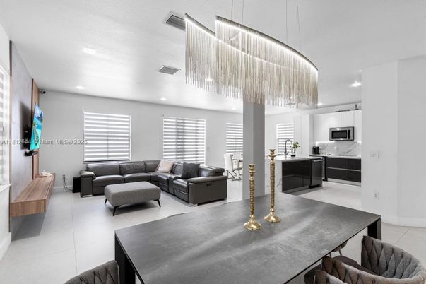 Chandelier, Dining room, Interior, Kitchen, Living room, Pendant Lights, Recessed Lighting, Stainless Steel Appliances