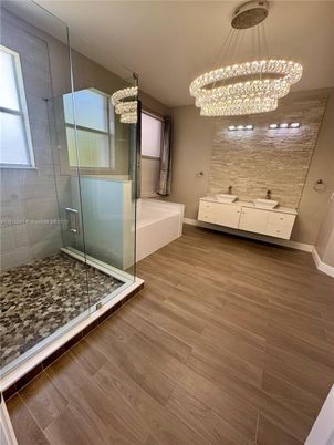Bathroom, Chandelier, Glass Shower, Interior, Wood Texture Flooring