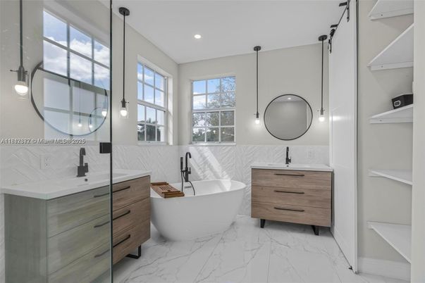 Bathroom, Dual Sink Vanities, Free Standing Baths, Interior, Marble, Pendant Lights, Recessed Lighting